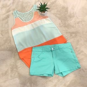 Edge brand sleeveless top